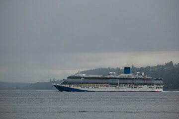 Modern family cruiseship cruise ship liner Luminosa sail away departure from Seattle, Washington...
