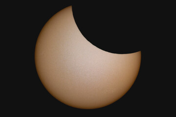 Partial Solar Eclipse with the Moon Partially Obscuring the Sun