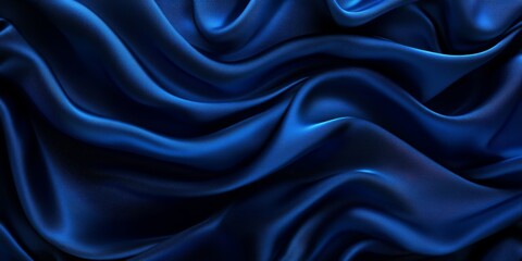 Obraz premium Luxurious blue satin fabric with rich folds, creating a soft and flowing texture. Elegant and vibrant material ideal for backgrounds, banners, or fashion-themed projects.