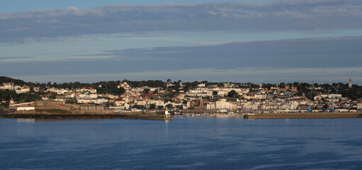 Town and harbor of St Peter Port, Guernsey, Channel Islands  - view from offshore