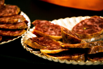 Traditional Spanish Sausage Slices on a Silver Platter