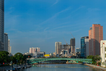 Obraz premium Mong Bridge (Cau Mong) - spanning Ben Nghe Canal connecting District 1 with District 4 in Ho Chi Minh City, Vietnam - is the only remaining ancient iron bridge in Saigon, built by the French in 1893
