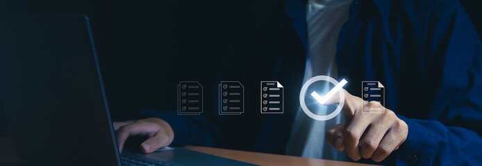 Concept of electronically checking smart items and documents on a virtual screen. Businessman checks electronic documents Borderless communication technology	