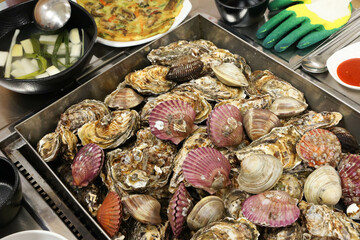 Korean Seafood Food. Steamed oysters and clams