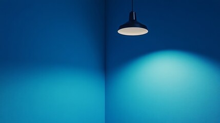 Blue square stand in a corner under a ceiling lamp for product display.