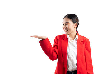 Smiling woman in a red blazer showcasing a welcoming gesture on a white background.