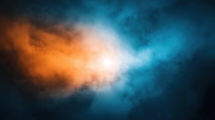 Obraz premium Abstract image of swirling orange and blue clouds with bright white light center creating a dynamic contrast of warm and cool colors.