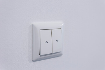 Exterior shutter switch for easy control of outdoor blinds, offering convenience and privacy management with a modern, user-friendly design.