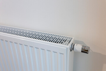 Radiator cranked to maximum, providing intense heat for optimal comfort and warmth in a modern living space.
