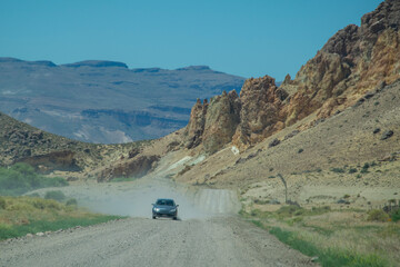Dirt road crossing patagonia landscape, chubut province, argentina