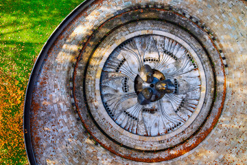 Aerial view of a non-functioning fountain in a city park