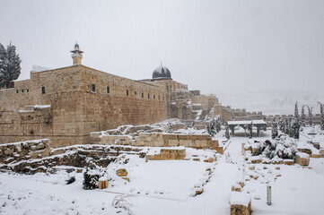 The western and southern walls and the Al Aqsa Mosque following a rare winter snowstorm in the Old City of Jerusalem.