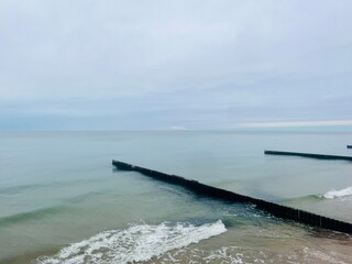 Cloudy sea horizon, gray day at the sea, calm water, seascape background