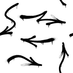 Seamless pattern of sprayed graffiti arrows with overspray in black over white. Vector illustration template