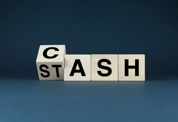 Wooden blocks spelling out CASH-STASH