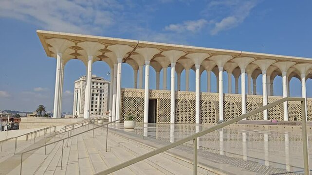 view from the courtyard of the great mosque of Algiers on the minaret, the highest in the world, with its arab-Muslim style decoration and the giant columns. Algiers. Algeria