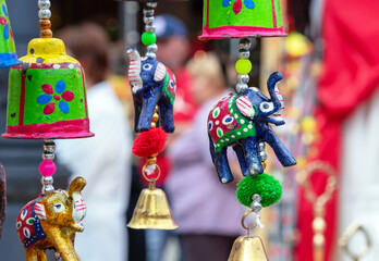 Indian festive garland with bells and elephants.