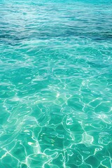 Obraz premium A person riding a surfboard in the open ocean