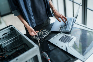 Computer repair technician specialist repairing and testing on Pc