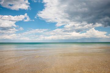 Fototapeta premium The calm tropical-looking water of Lake Michigan off Harrington Beach State Park, Belgium, Wisconsin in late spring
