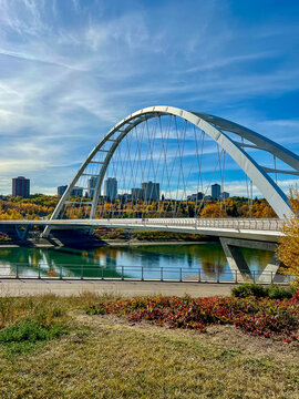 Edmonton, Alberta - October 13, 2024: Views of the Edmonton skyline with the Walterdale Bridge over the North Saskatchewan River in the foreground
