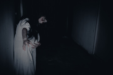Portrait of asian woman make up pregnant ghost.,Scary horror scene for background,Halloween...