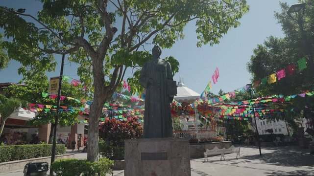 The statue of Ignacio Vallarta in Plaza Principal de las Armas in Puerto Vallarta, Mexico by Guadalajara artist Miguel Miramontes Carmona.