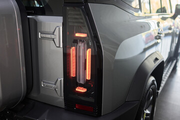 Fototapeta premium Closeup of a cars automotive tail brake light