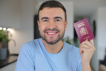 Man holding a Spanish passport 