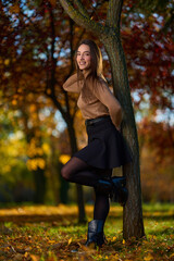 Latin lady in a colorful park in the autumn