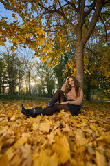 Latin lady in a colorful park in the autumn