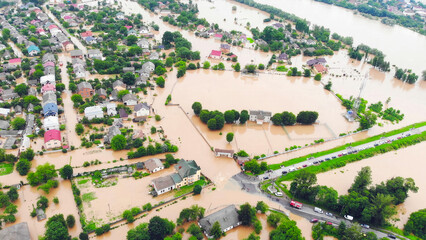 Aerial View of Severe Flooding in Residential Area. Aerial photo capturing extensive flooding in a...
