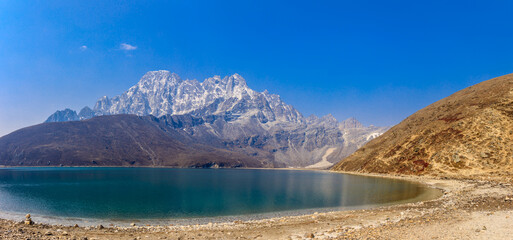 Himalaya mountains beautiful scenic landscape on Everest Base Camp trek. Hiking through Himalayas in Nepal among high altitude snow peaks and summits in Khumbu valley glacier at the bottom of Everest