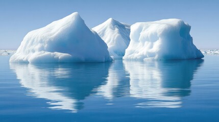 Three icebergs float in a calm blue ocean.