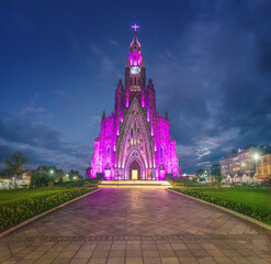 Fototapeta premium Illuminated Cathedral of Stone at night (Catedral de Pedra) - Church of Our Lady of Lourdes - Canela, Rio Grande do Sul, Brazil