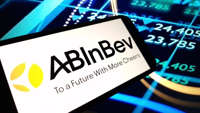 Konskie, Poland - November 12, 2024: Anheuser-Busch InBev company logo displayed on mobile phone