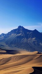 Fototapeta premium Desert landscape in Gran Canaria, Canary Islands, Spain, showcasing rolling sand dunes under