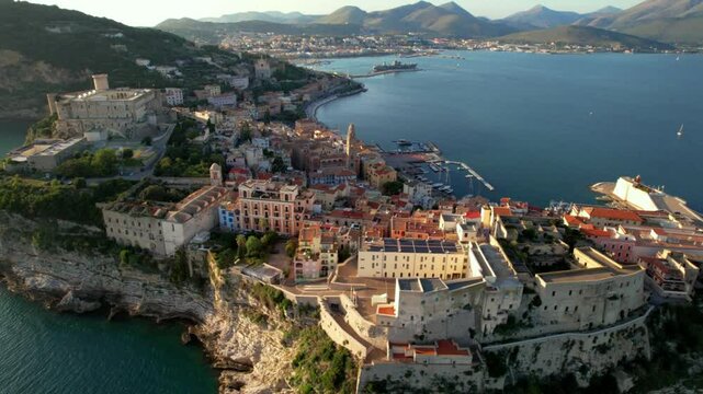 Gaeta Italy Sunset Drone Video, Aerial View of Aragonese Castle on Steep Cliffs, Scenic Peninsula Panorama with Medieval Fortress and Coastal City Skyline, Cinematic Southern Lazio Travel 4K