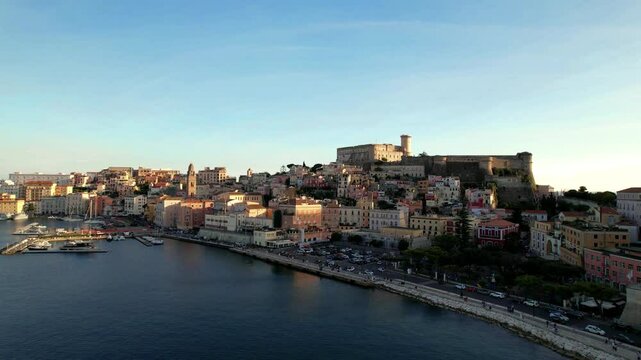 Gaeta Italy 4k drone aerial video of coastal town on Ulysses Riviera. Scenic Tyrrhenian sea view of historic fortress and beautiful beach between Rome and Naples. Mediterranean travel b-roll scenery