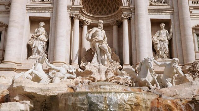 Close-up central sculptures showcasing Neptune surrounded allegorical figures majestic horses. Intricate Baroque details highlight Rome artistic heritage