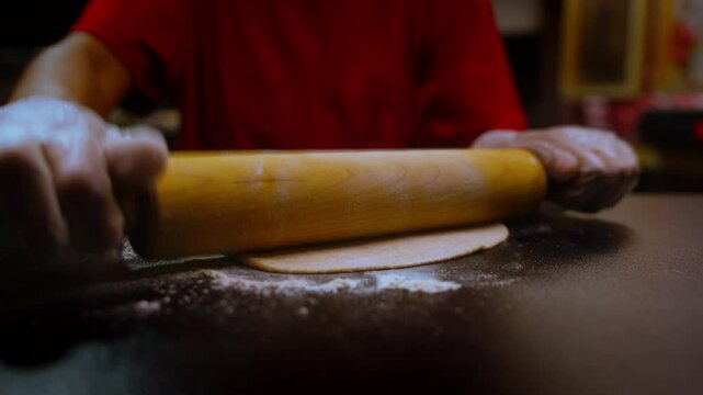 Rolling out dough in a professional kitchen