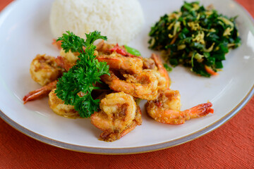 Udang Sere Lemo Balinese Stir Fried Prawns Seasoned with Shallot, Chili Oil and Lime Leaves Served with Steamed white Rice