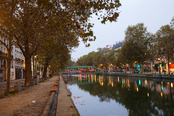 The Canal Saint-Martin at night .It is long canal connecting to the river Seine, Paris, France.