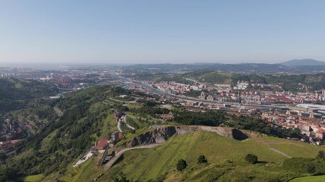 Aerial footage of the Mount Cobetas, on a sunny day in Bilbao city, Biscay, Spain