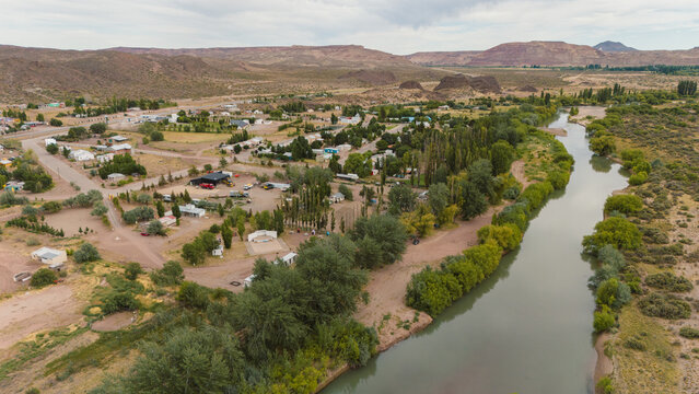 Aerial view of a small village by the river