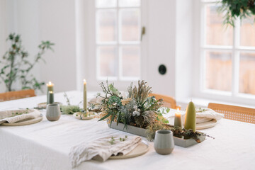Elegant table setup with candles and decorations