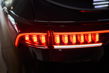 Obraz premium Closeup of a cars automotive tail brake light