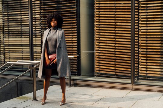 Sophisticated Woman in Modern Cityscape