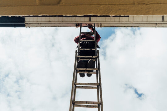 Climbing the Ladder to Fix Gutters