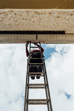 Climbing the Ladder to Fix Gutters